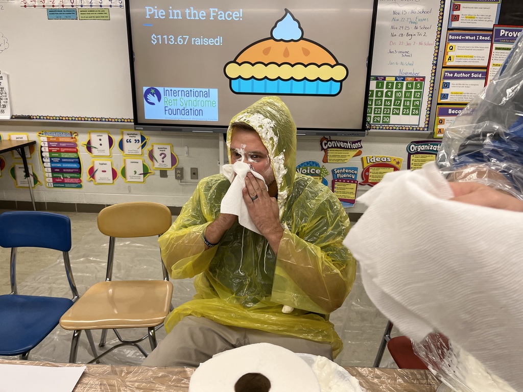 Mr. Hessbrook cleans up after receiving a pie.