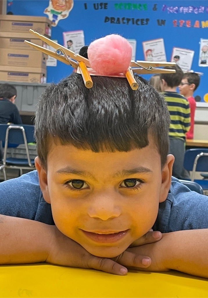 student with nest hat 