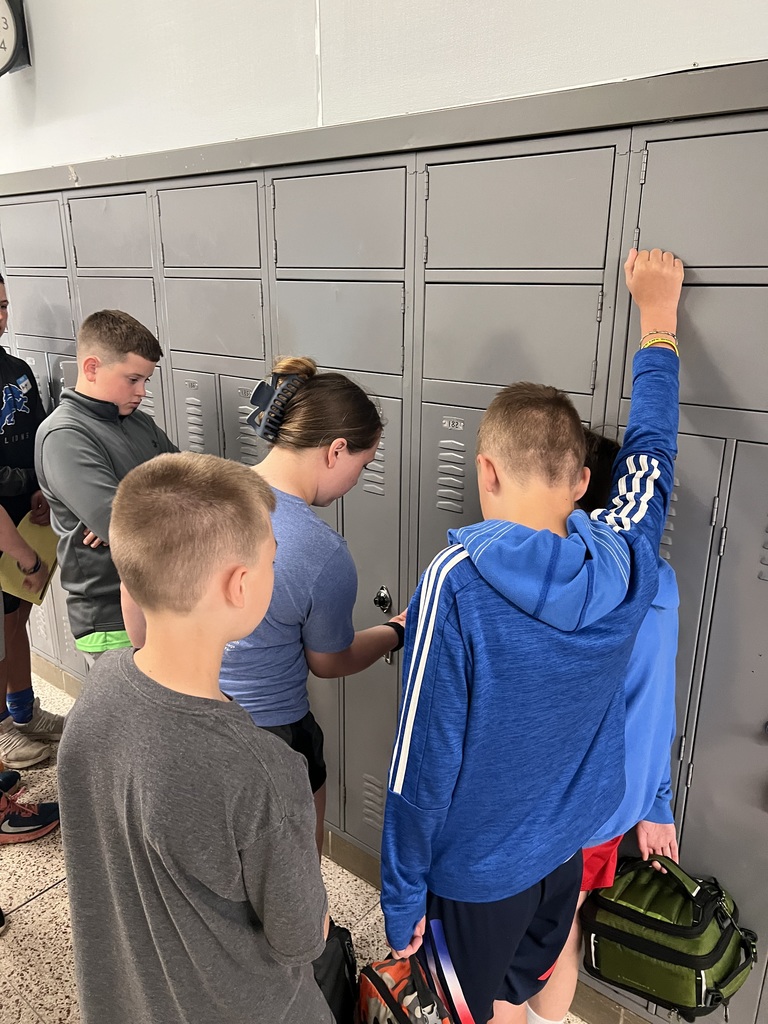 7th/8th graders showing our 6th graders how to open their lockers