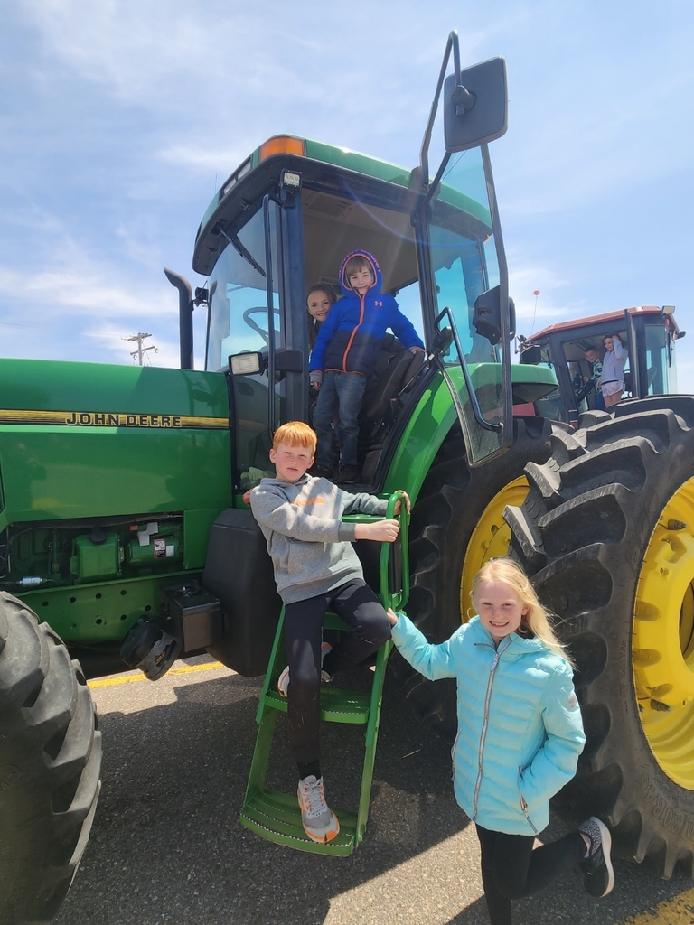 students in tractor